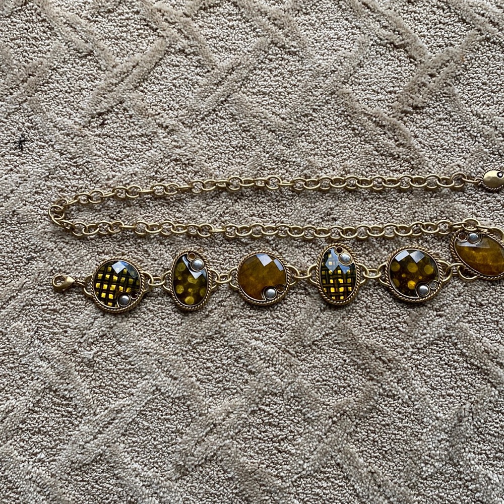 Gold tone chain-link belt from Chico’s. Fully adjustable. Great condition.
